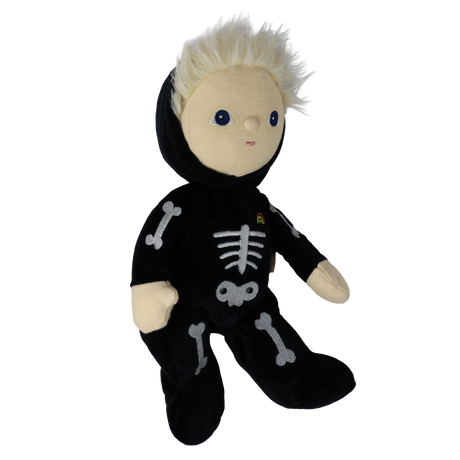Plush blonde doll in a black skeleton suit shown seated from a three-quarter angle.