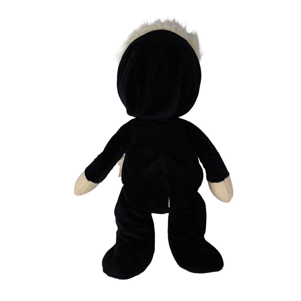 Back view of a plush blonde doll wearing a hooded black skeleton suit.