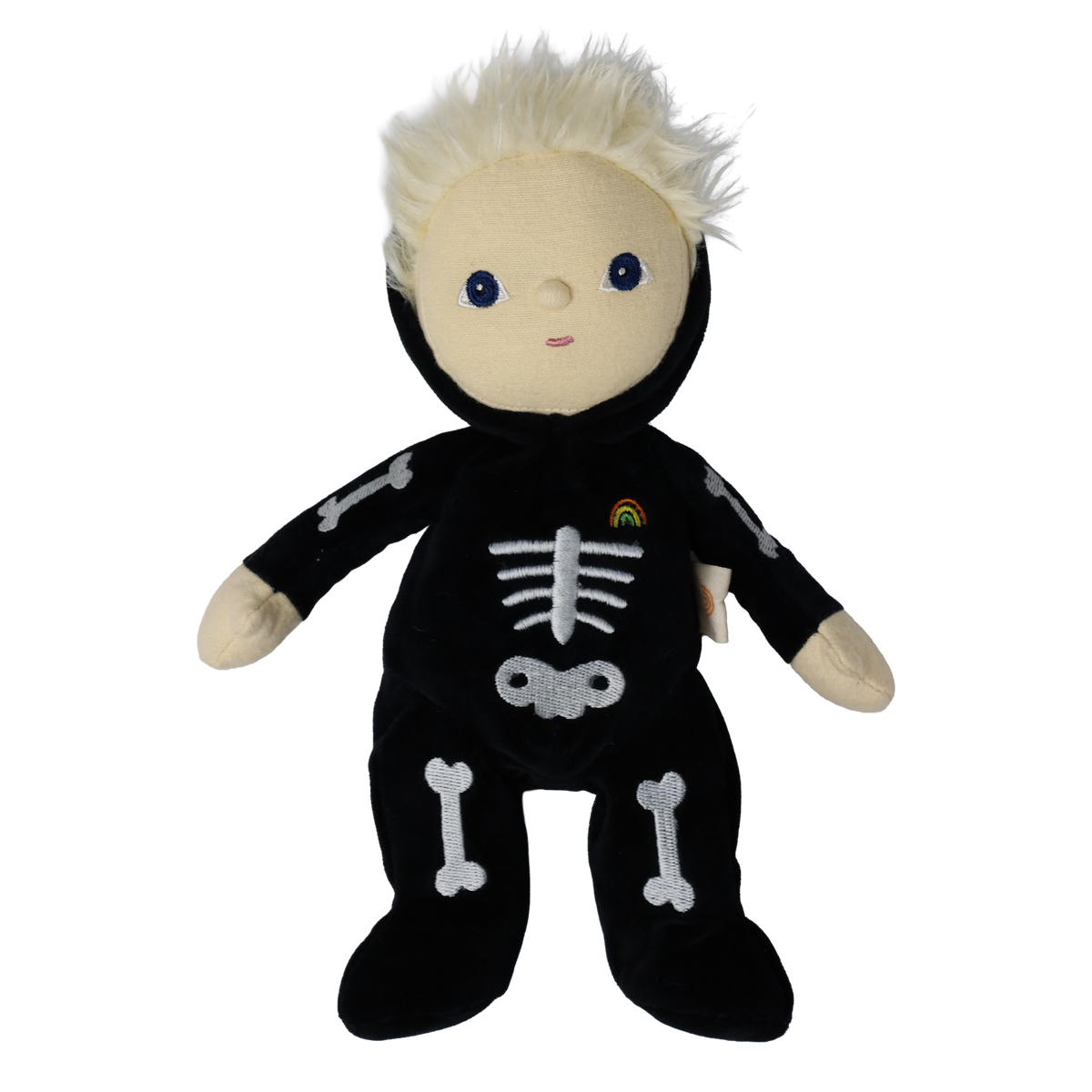 Plush blonde doll wearing a black skeleton bodysuit with embroidered bones and a rainbow patch.