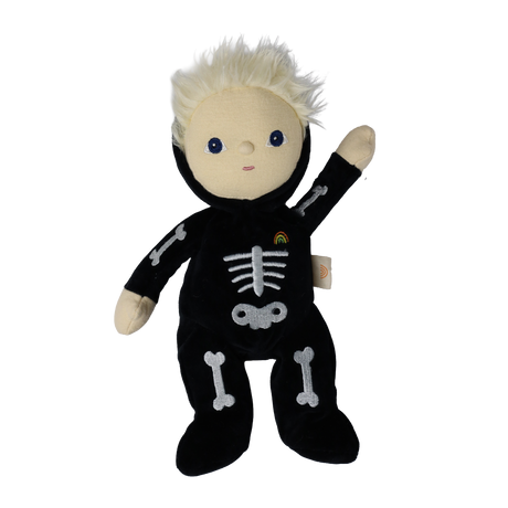 Plush blonde doll in a black skeleton suit with embroidered bones, raising one hand in a wave.