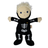 Plush blonde doll in a black skeleton suit with arms stretched out to the sides.
