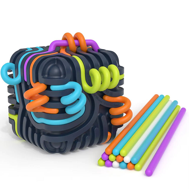 Black sensory activity cube threaded with colorful flexible sticks alongside extra sticks.