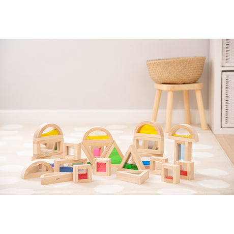 A set of wooden blocks with different textures, sounds, and visual elements, designed to engage children's senses and support early development.