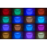 An illuminated LED table with a deep circular well, designed for sensory play, color exploration, and interactive learning activities.