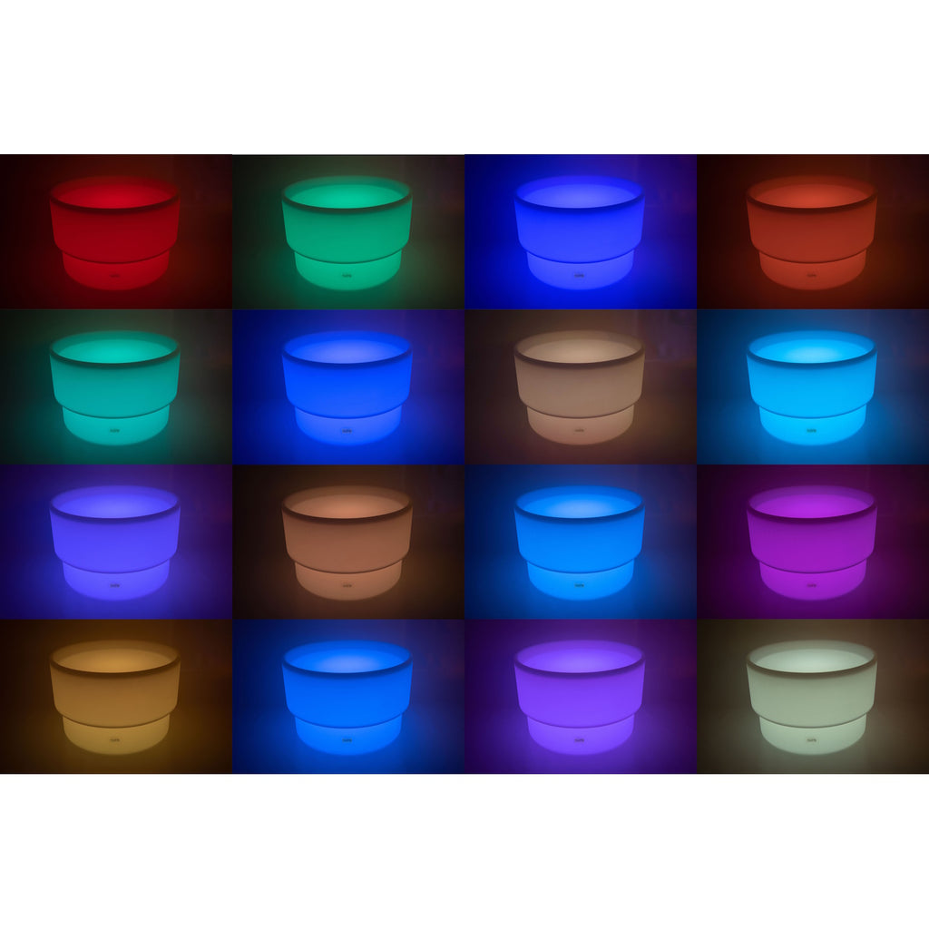 An illuminated LED table with a deep circular well, designed for sensory play, color exploration, and interactive learning activities.