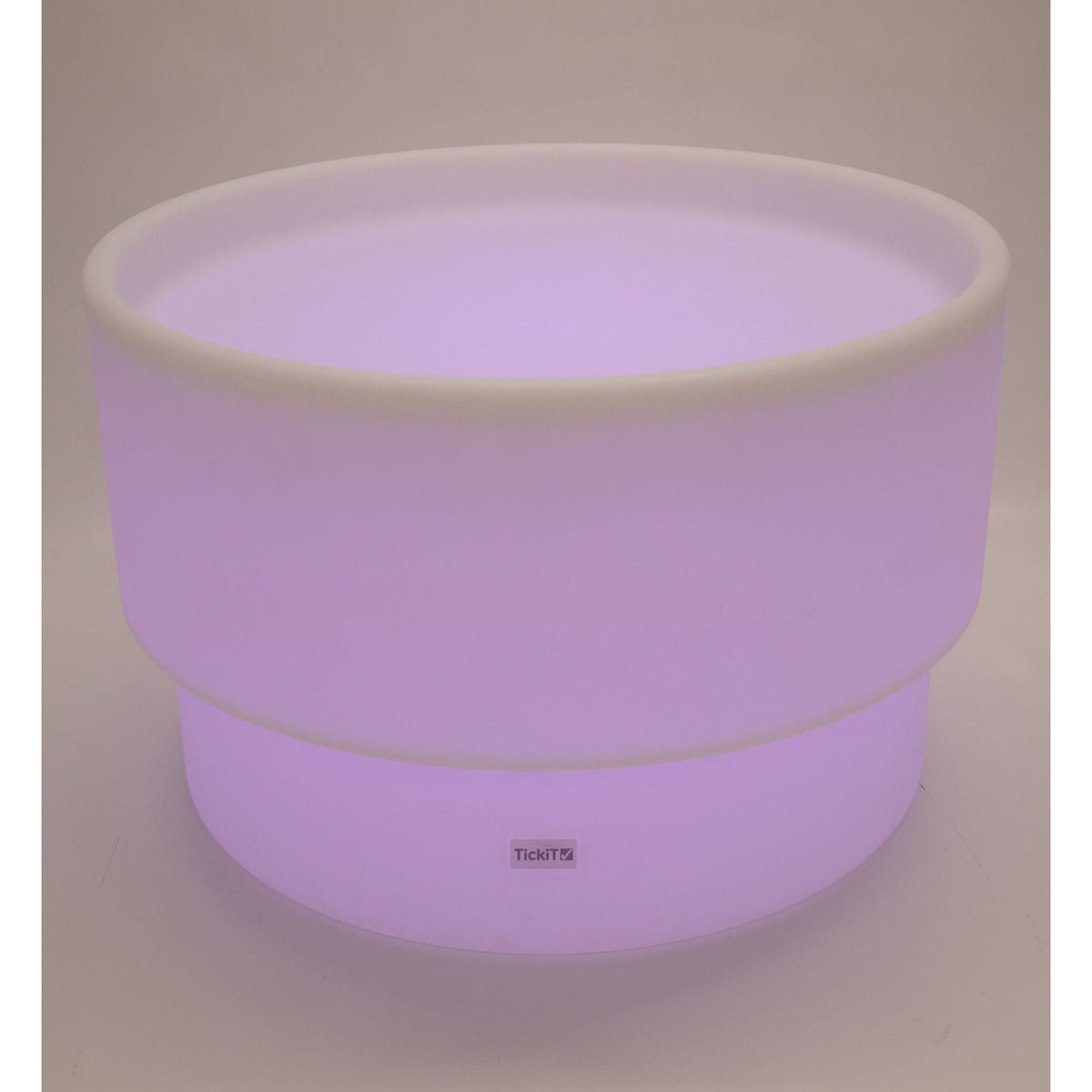 An illuminated LED table with a deep circular well, designed for sensory play, color exploration, and interactive learning activities.