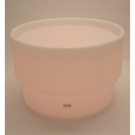 An illuminated LED table with a deep circular well, designed for sensory play, color exploration, and interactive learning activities.
