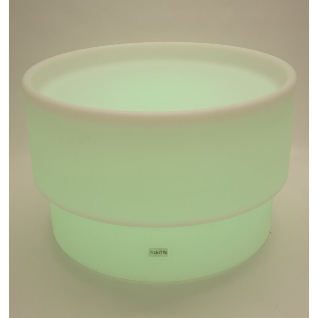 An illuminated LED table with a deep circular well, designed for sensory play, color exploration, and interactive learning activities.