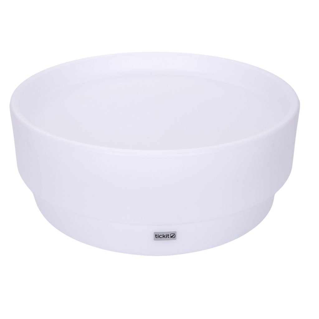 A softly glowing LED table with a shallow well, designed for sensory exploration, water play, and immersive learning experiences.