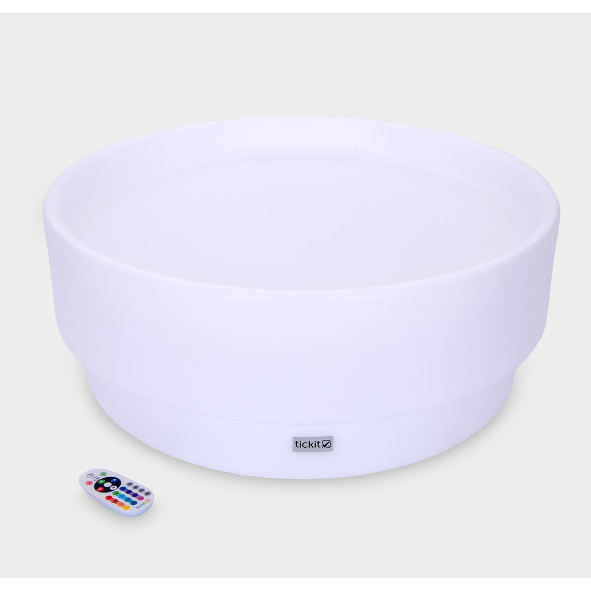 A softly glowing LED table with a shallow well, designed for sensory exploration, water play, and immersive learning experiences.