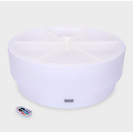 A softly glowing LED table with a shallow well, designed for sensory exploration, water play, and immersive learning experiences.