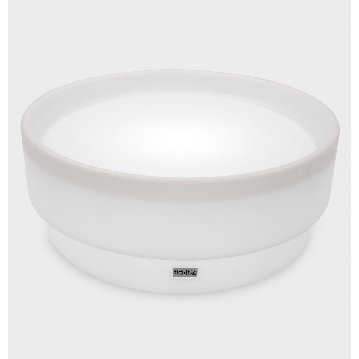 A softly glowing LED table with a shallow well, designed for sensory exploration, water play, and immersive learning experiences.