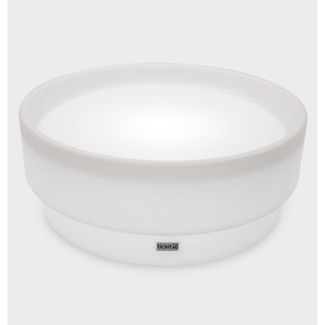 A softly glowing LED table with a shallow well, designed for sensory exploration, water play, and immersive learning experiences.