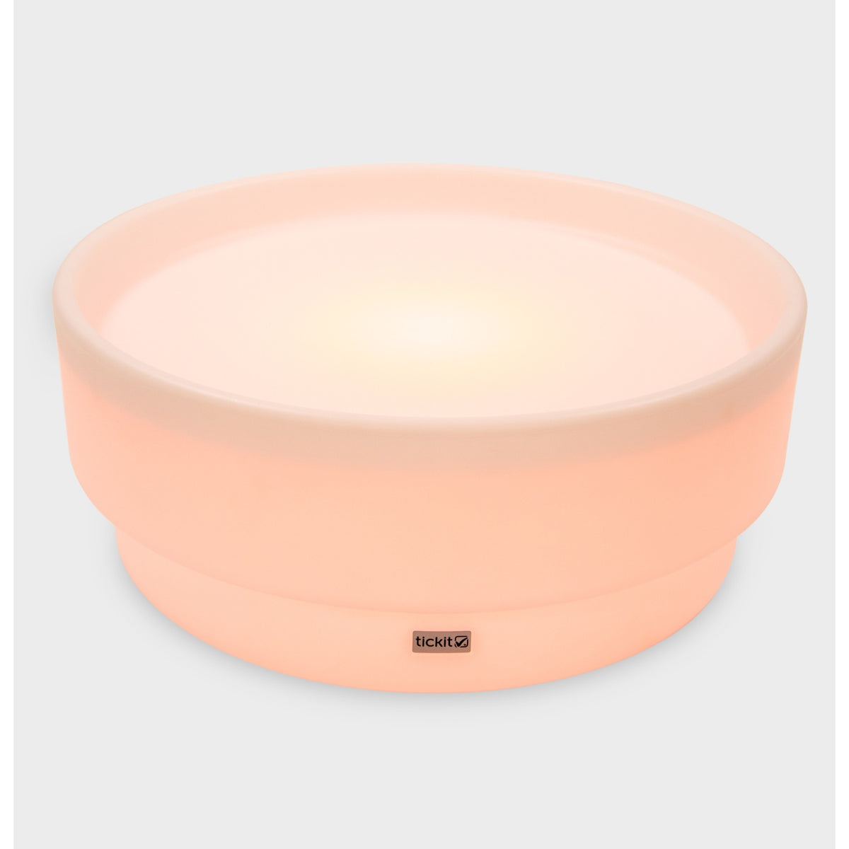 A softly glowing LED table with a shallow well, designed for sensory exploration, water play, and immersive learning experiences.
