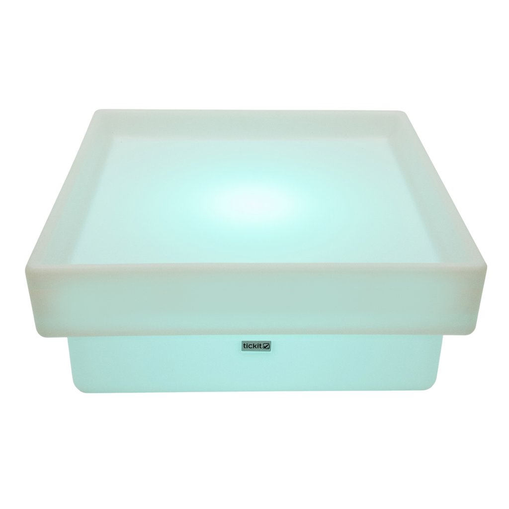 An illuminated square LED table with a raised edge, designed for sensory exploration, water play, and interactive learning.