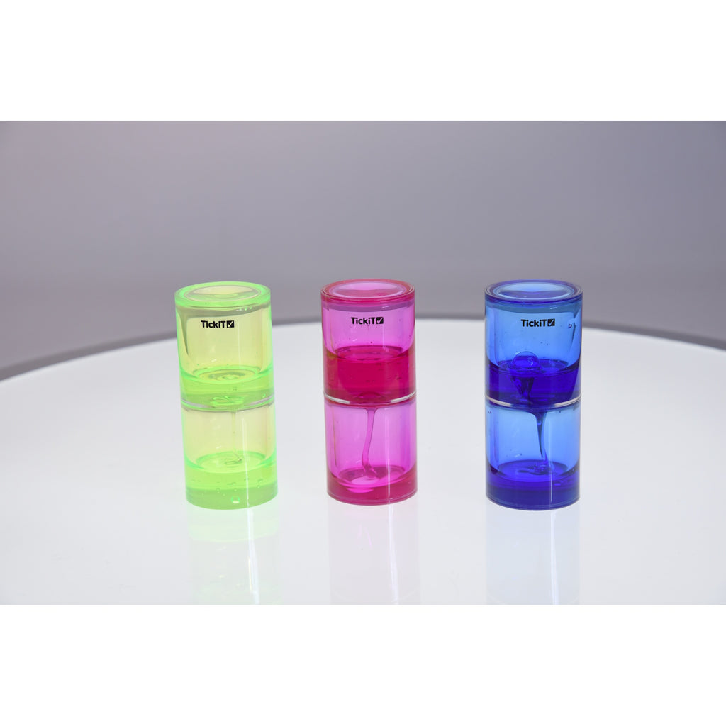 A trio of transparent tubes filled with slow-moving, colorful gel, designed to engage visual attention and support calming sensory play.