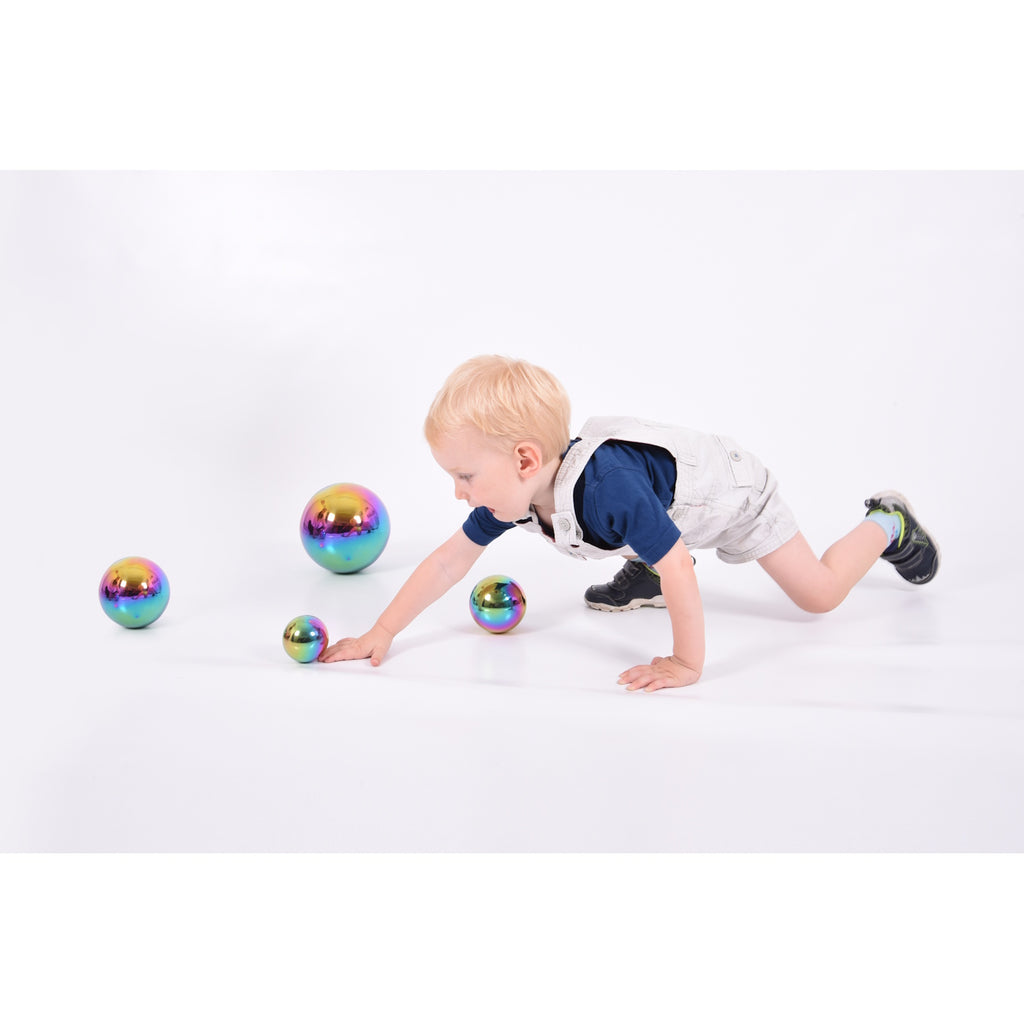 A set of colorful balls with reflective surfaces, designed to engage children in sensory play and visual stimulation.