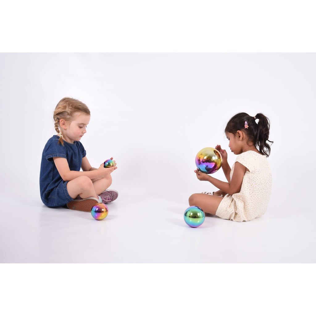 A set of colorful balls with reflective surfaces, designed to engage children in sensory play and visual stimulation.