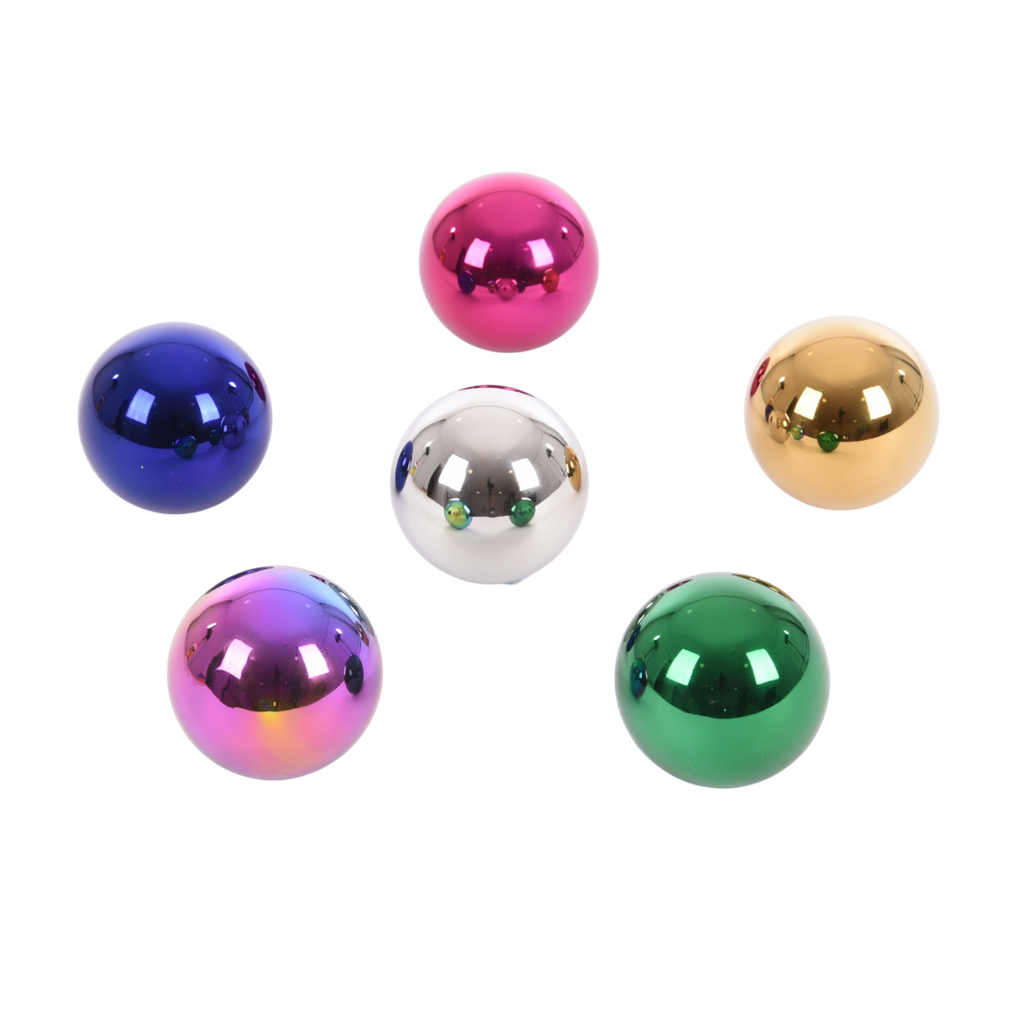 A set of colorful, reflective sensory balls that change appearance with movement, designed to engage children in tactile exploration and visual stimulation.