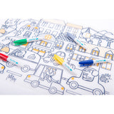 Super Petit silicone coloring mat featuring city street line art and five colorful marker pens.