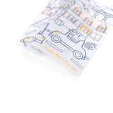 Moulin Roty x SuperPetit silicone coloring mat featuring an illustrated city scene with cars and houses.