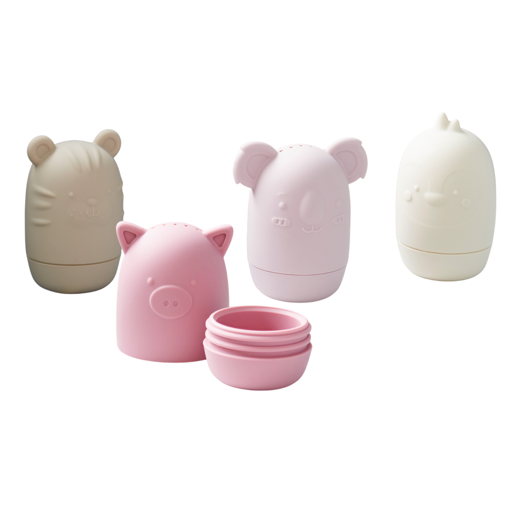 A set of soft silicone animal-shaped squirters in earthy tones, perfect for sensory play and water activities, designed for young children.