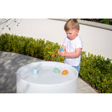 A set of soft silicone animal-shaped squirters in neutral tones, designed for sensory play and water-based fun, perfect for young children.