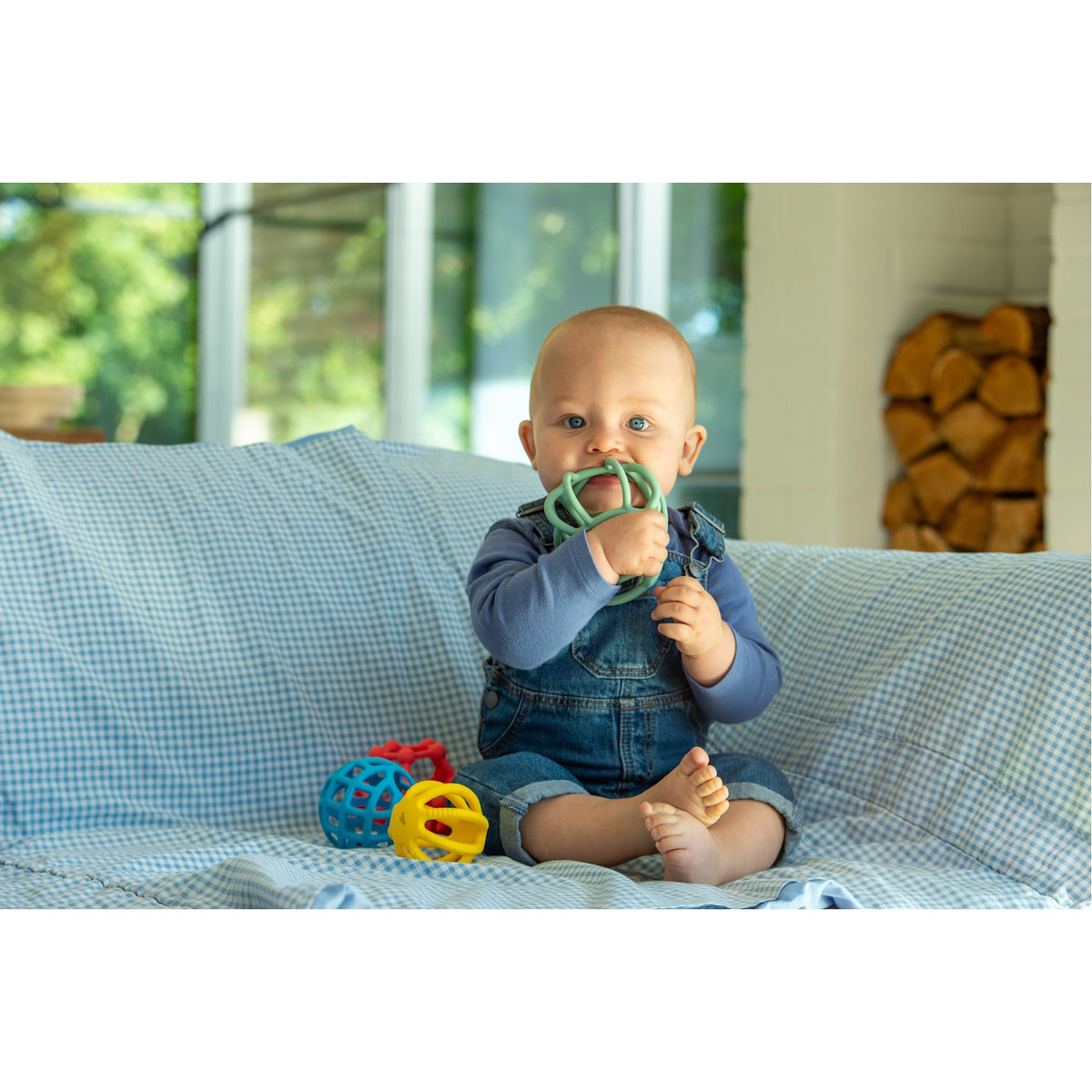 A set of colorful, soft silicone balls with a flexible texture, designed to promote sensory play and tactile exploration.