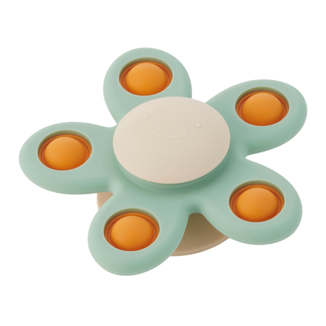A soft silicone toy with a flower-shaped design, featuring gentle spinning motion in neutral colors, perfect for sensory play and motor skill development.