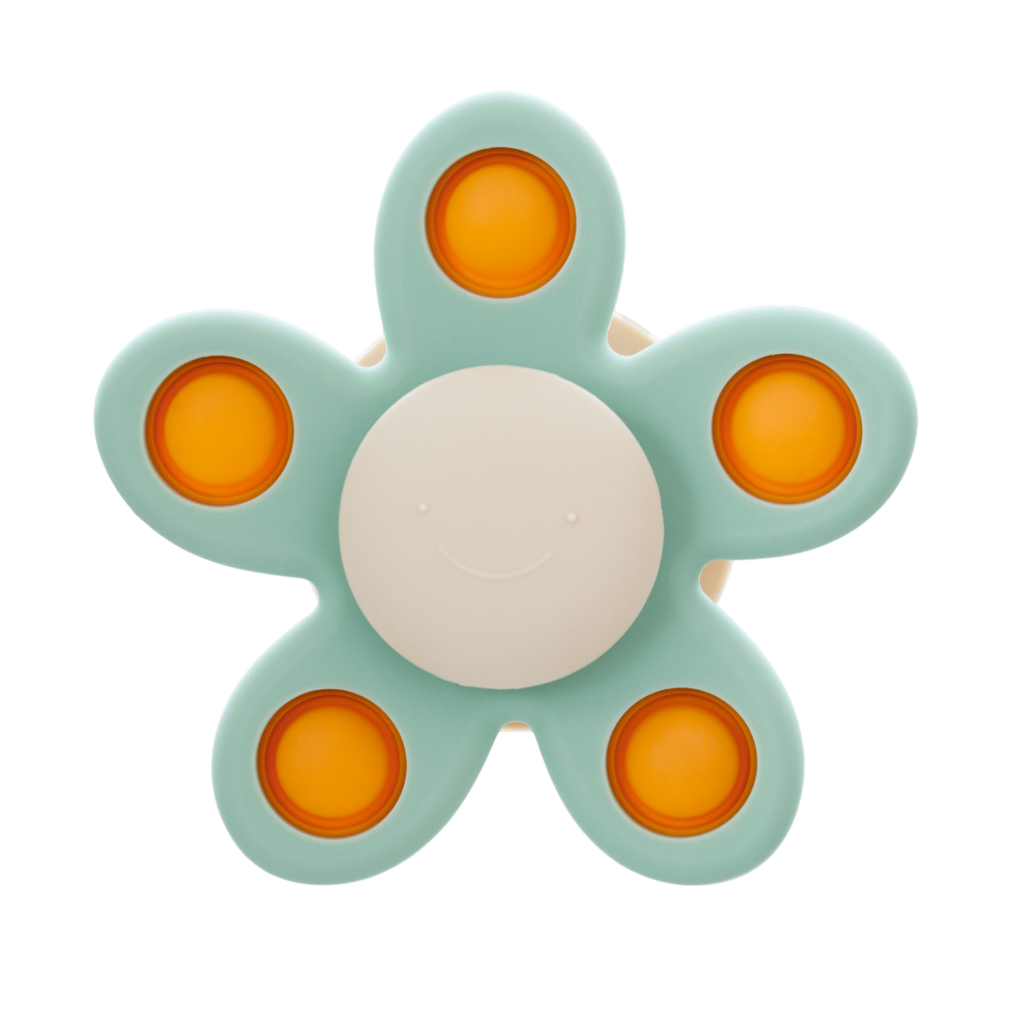 A soft silicone toy with a flower-shaped design, featuring gentle spinning motion in neutral colors, perfect for sensory play and motor skill development.