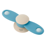 A soft silicone toy featuring a propeller design in neutral tones, ideal for sensory exploration and fine motor skill development.