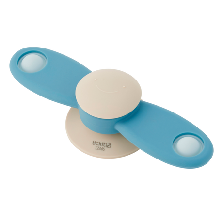 A soft silicone toy featuring a propeller design in neutral tones, ideal for sensory exploration and fine motor skill development.