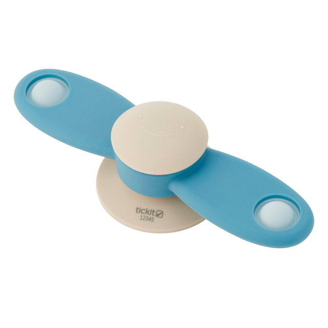 A soft silicone toy featuring a propeller design in neutral tones, ideal for sensory exploration and fine motor skill development.