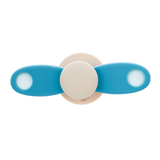 A soft silicone toy featuring a propeller design in neutral tones, ideal for sensory exploration and fine motor skill development.