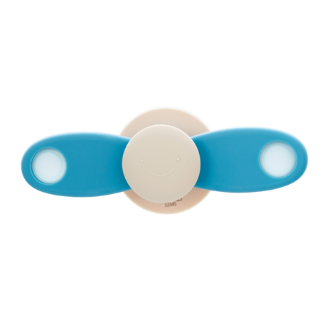 A soft silicone toy featuring a propeller design in neutral tones, ideal for sensory exploration and fine motor skill development.