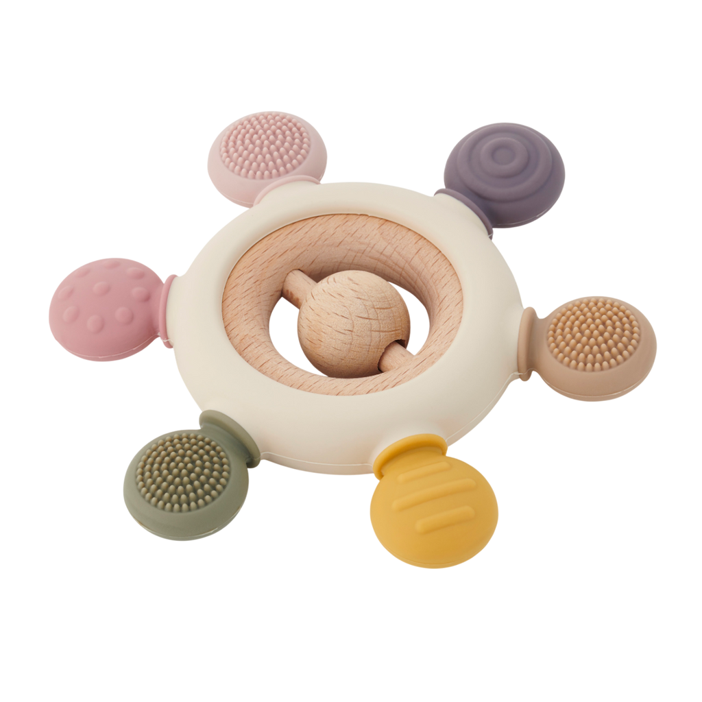 A soft silicone teether with a built-in rattle, designed in earthy tones to soothe and engage babies while promoting sensory development.