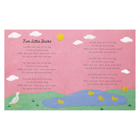 Inside page of nursery rhyme book "Five Little Ducks" with embroidered ducks, pond, and hills on a pink background.