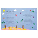 Embroidered teddy bears on a picnic blanket with "Teddy Bears' Picnic" song lyrics on a blue fabric background.