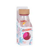 A sensory bottle with a floating mermaid figure inside, encased in packaging labeled "Ooohh! Sensory Bottle."