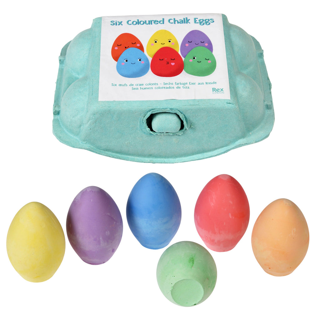 A carton holding six pastel-colored chalk eggs in yellow, purple, blue, red, green, and orange, with a playful label on top.