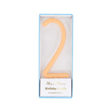 Peach-orange slim number 2 birthday candle packaged in a clear box by Meri Meri.
