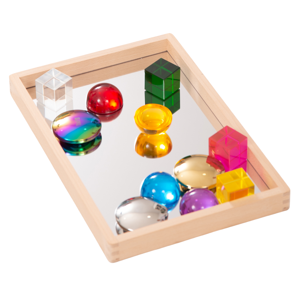 A compact wooden tray with a mirrored base, perfect for sensory play, loose parts exploration, and visual perception activities.