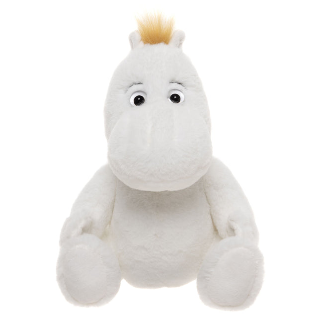 Plush toy resembling a white hippo with round eyes, small ears, and a tuft of blond hair on top. It sits upright, conveying a friendly and cute demeanor.