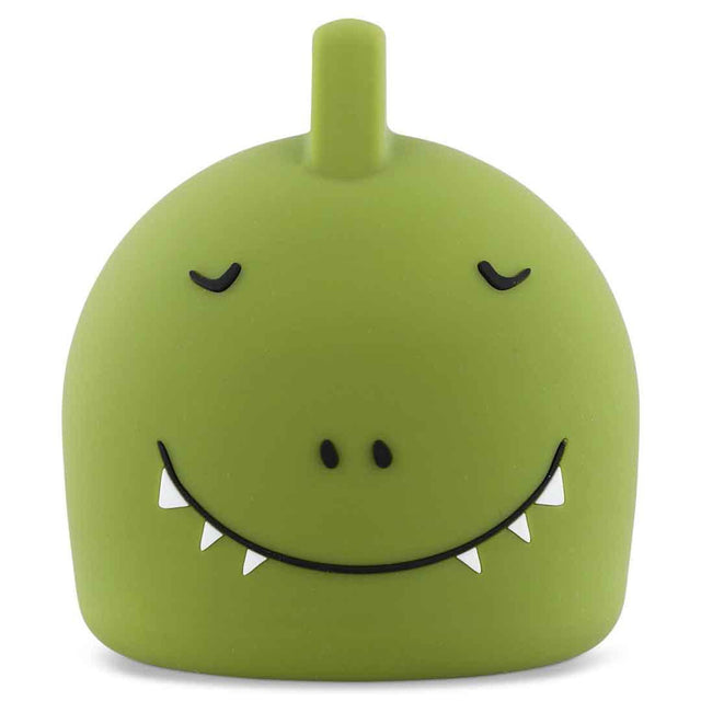 Cute green dino lamp with a round body and a small horn on top, featuring a large, smiling mouth with tiny teeth and shut eyes, exuding a playful vibe.