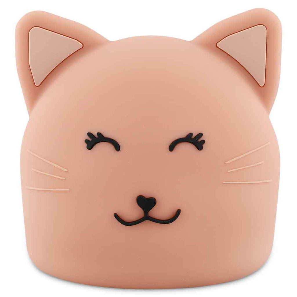 Cute cat-shaped night light in soft peach color with closed eyes and a smiling face. Features pointed ears and whiskers, conveying a playful tone.