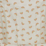 Close-up of off-white quilted fabric featuring a seamless pattern of colorful mini rainbows.