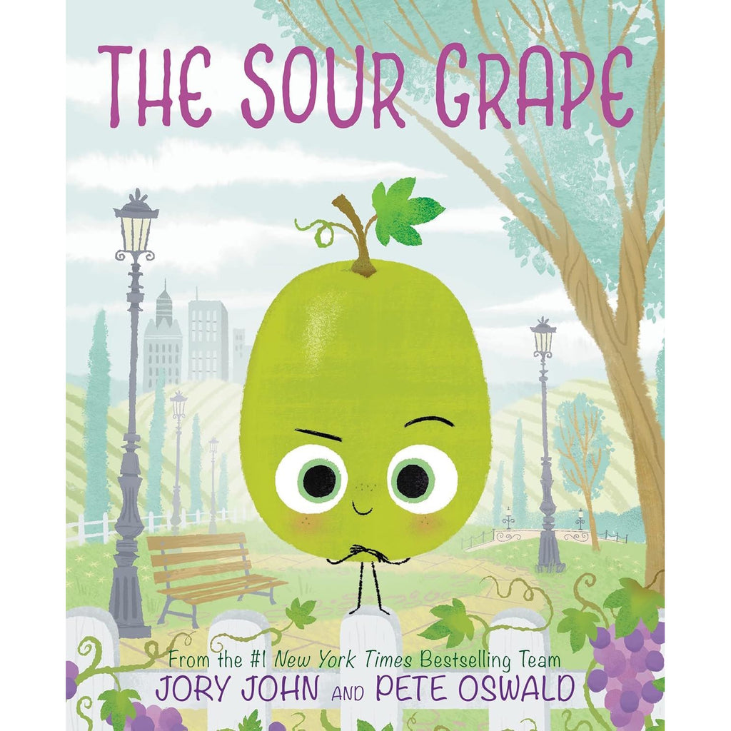 A green grape with a mustache and large eyes stands on a fence in a park. The background has trees, vintage lampposts, and distant city buildings. The title "The Sour Grape" is above. The tone is playful and whimsical.