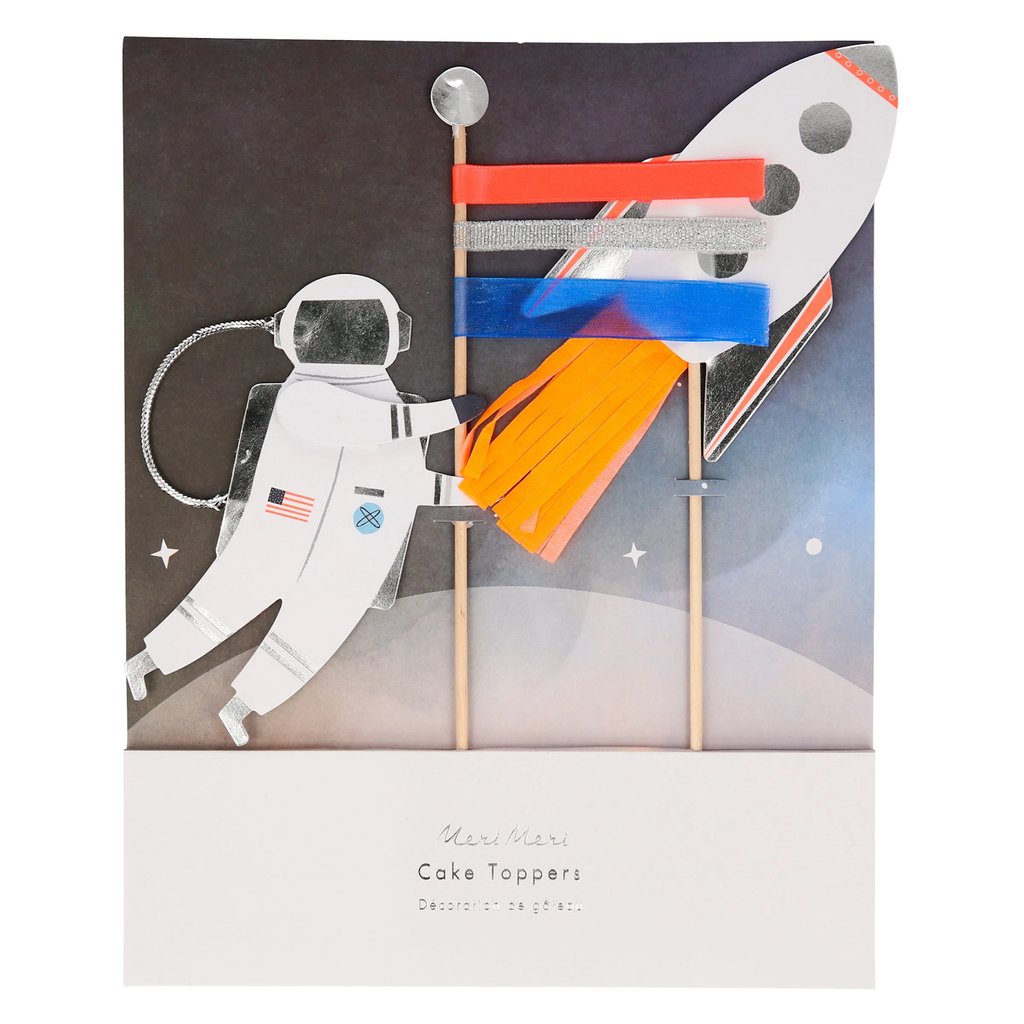 A set of space-themed cake decorations featuring rockets, stars, and planets, perfect for adding a cosmic touch to cakes.