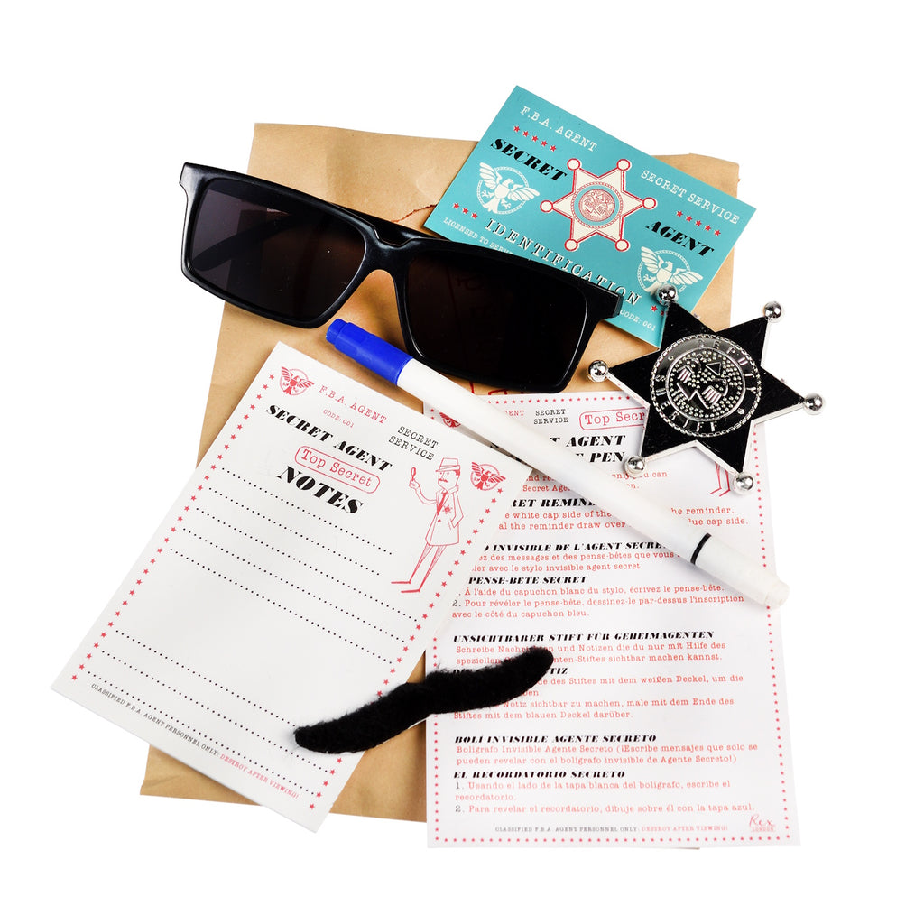 A special agent kit with sunglasses, magnifying glass, secret messages, and various investigation tools, all in a decorative case.