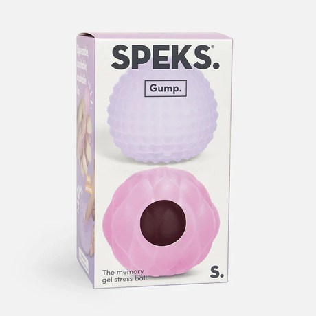 Packaging for a "Speks" Gump memory gel stress ball. It displays a lavender ball with a textured pattern and a pink ball with a central hole.